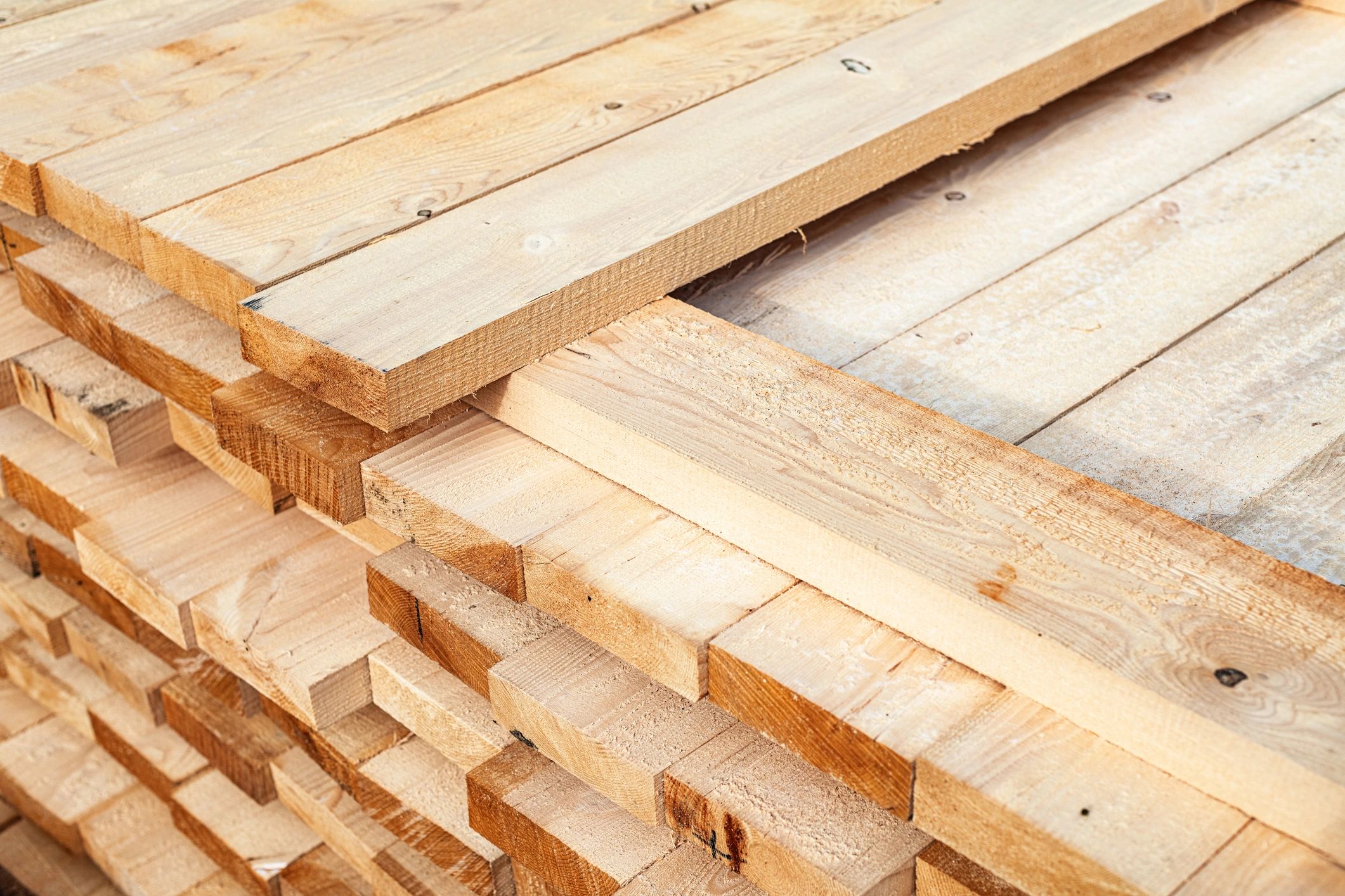 Stacks of spruce studs at a lumberyard